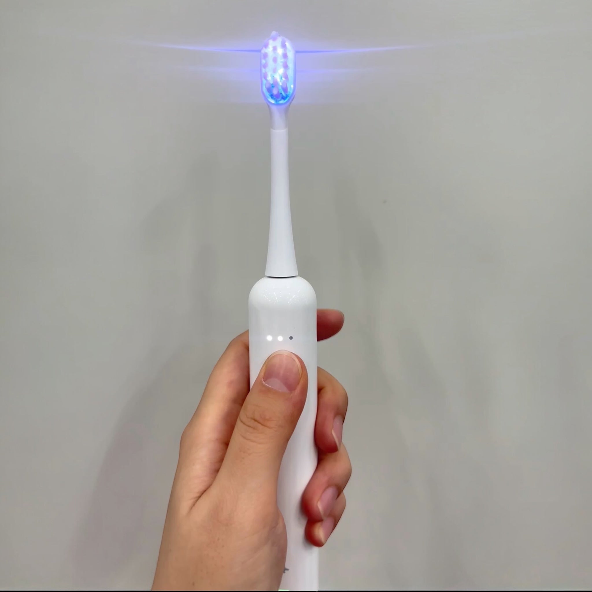 Avanceret Vibrosonic Tandbørste med tandblegende blåt lys – Effektiv tandpleje & tandblegning i Ét